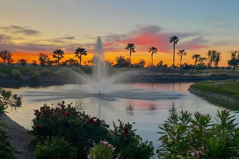 a view of a chairs and table in patio