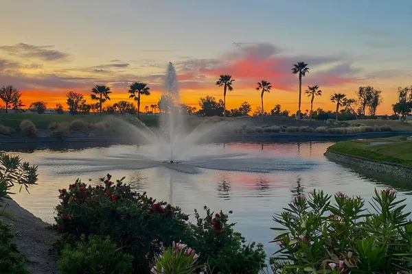 a view of a chairs and table in patio