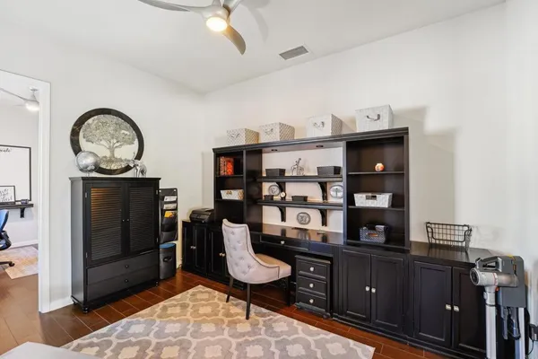 a view of a workspace with furniture