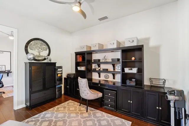 a view of a workspace with furniture