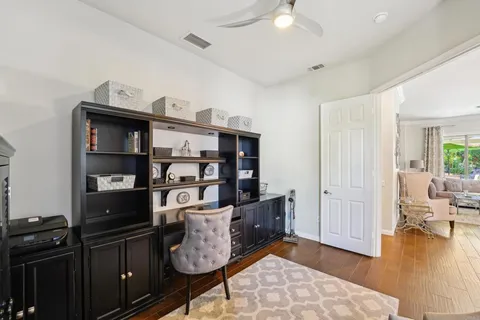 a view of a workspace with furniture
