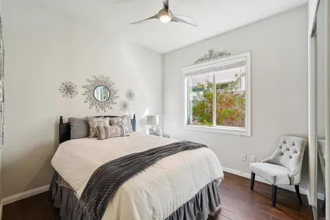 a view of a bathroom with a sink and a mirror