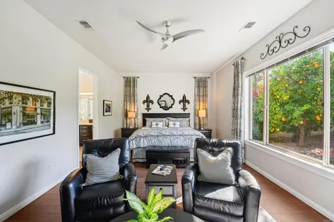 a work room with furniture and wooden floor