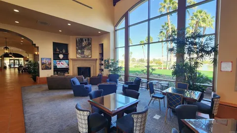 a sign that is in front of flowers