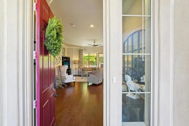a view of a entryway with furniture and front door