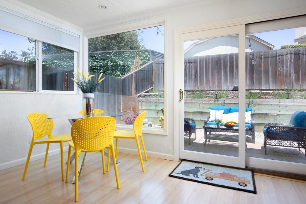 380 Sea Ridge Road, Unit E Aptos, CA 95003 - Photo 15 of 27 a living room with furniture and a large window