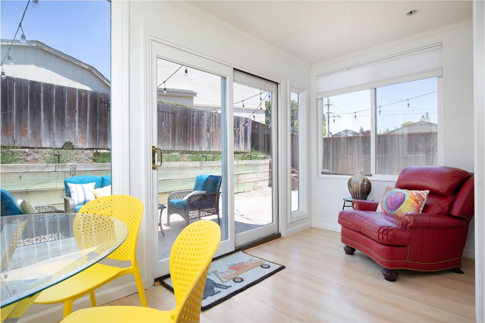380 Sea Ridge Road, Unit E Aptos, CA 95003 - Photo 16 of 27 a living room with furniture and a large window