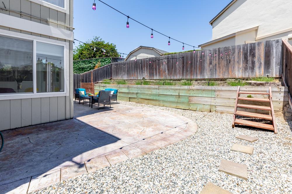 380 Sea Ridge Road, Unit E Aptos, CA 95003 - Photo 7 of 27 a view of a backyard with a sitting area
