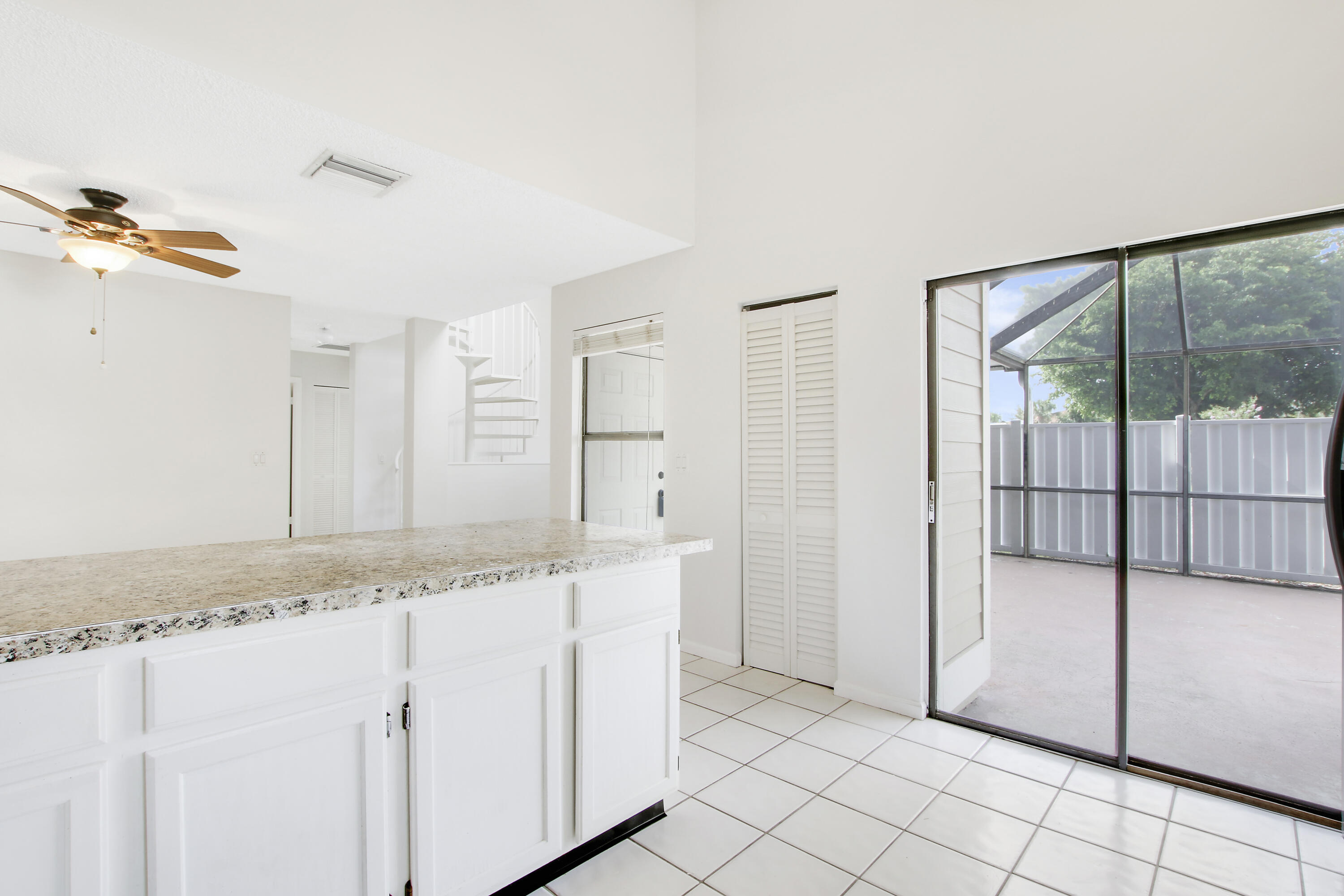 302 Summerwinds Lane Jupiter, FL 33458 - Photo 18 of 41 Kitchen Patio access