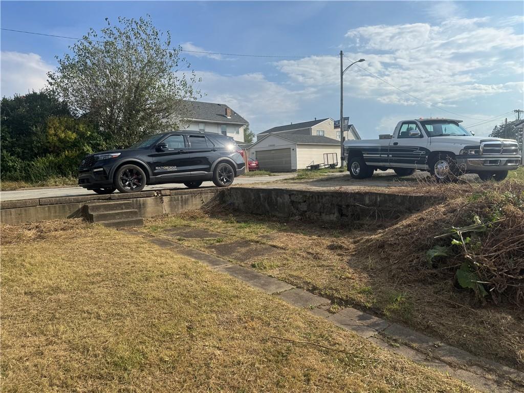 2212 Freeport Road Natrona Heights, PA 15065 - Photo 19 of 26 a front view of a house with cars parked
