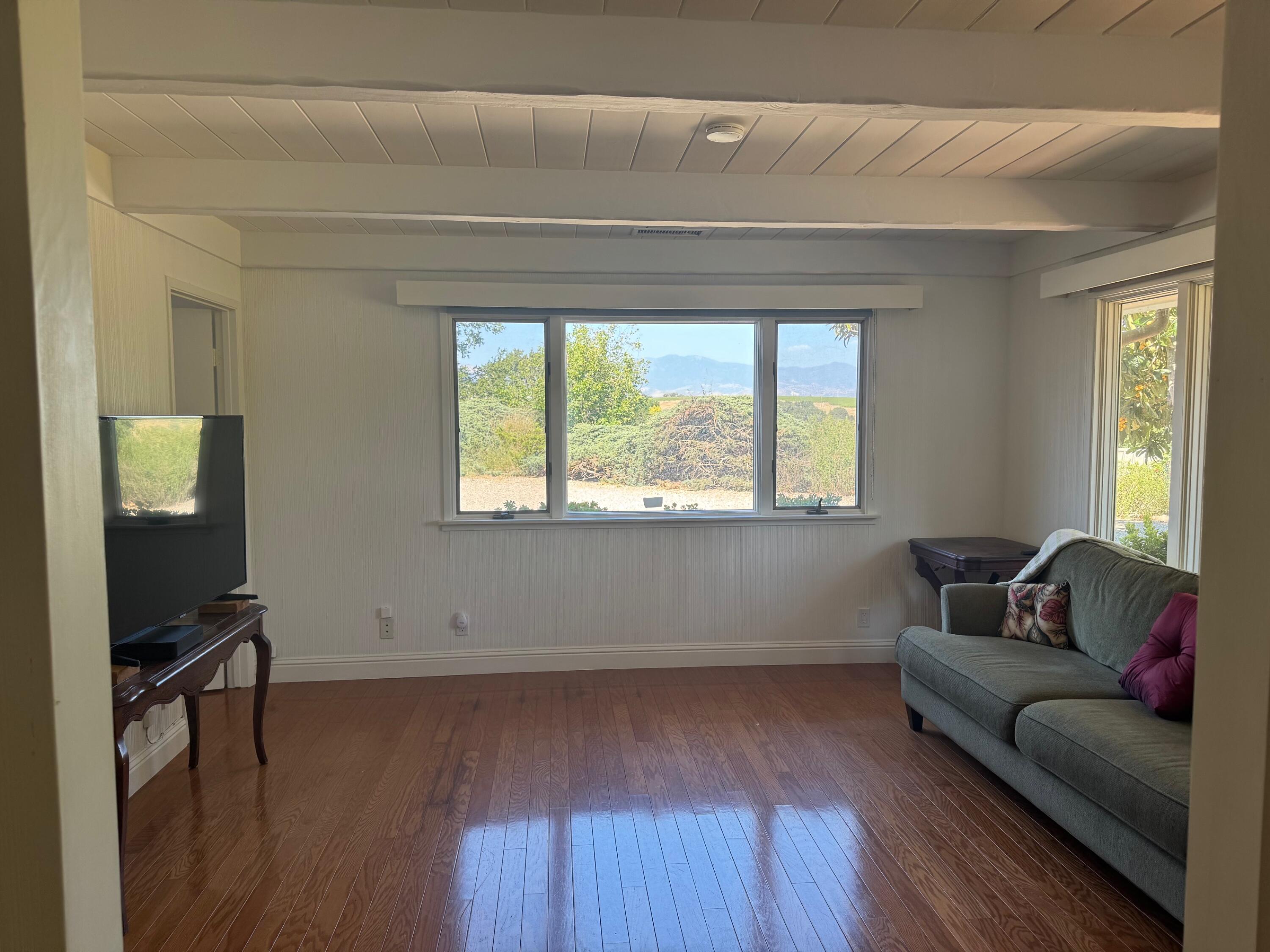 724 North Refugio Road Santa Ynez, CA 93460 - Photo 4 of 17 a living room with furniture and a window