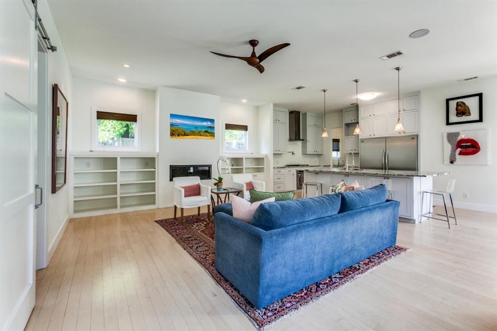 4206 Manning Lane Dallas, TX 75220 - Photo 10 of 35 a living room with furniture and a wooden floor