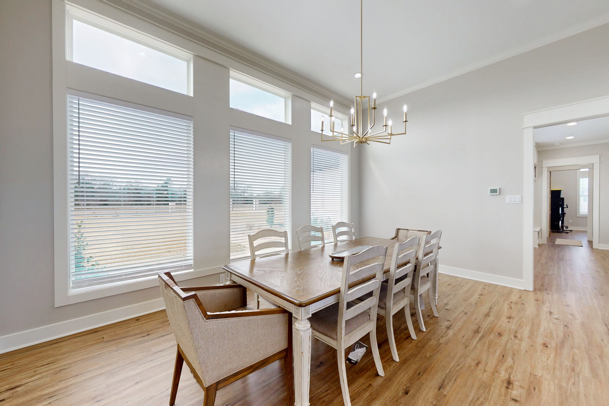 13504 Hudson Farms Road Franklin, TX 77856 - Photo 9 of 49 a view of a dining room with furniture window and wooden floor