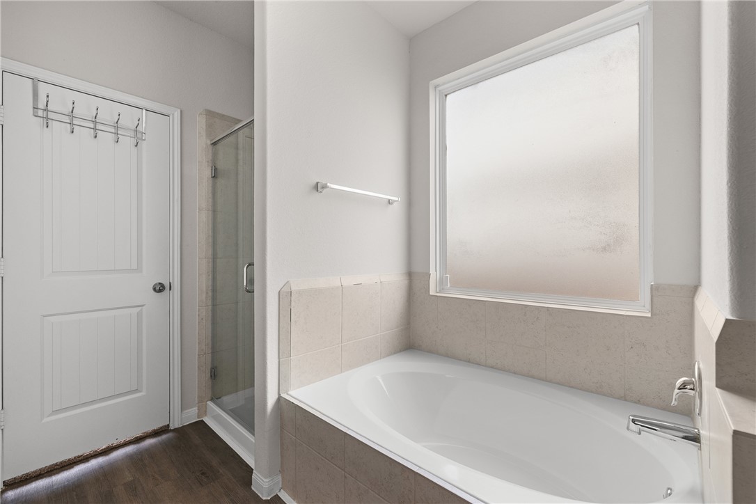 4702 Nopalitos Way Bryan, TX 77807 - Photo 15 of 27 a view of bathroom with bathtub and shower