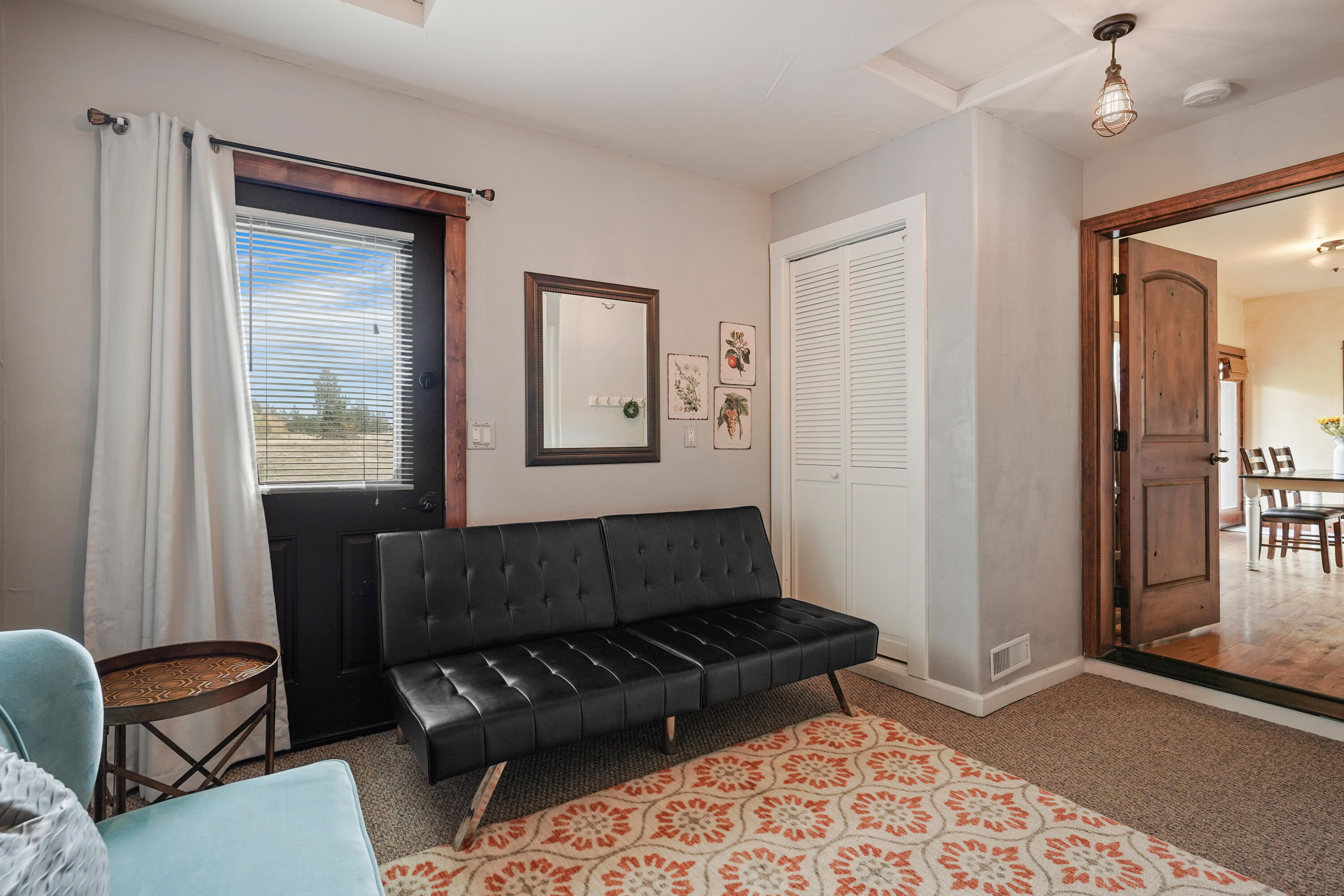 63520 Cricketwood Road Bend, OR 97701 - Photo 57 of 84 a living room with furniture and a window