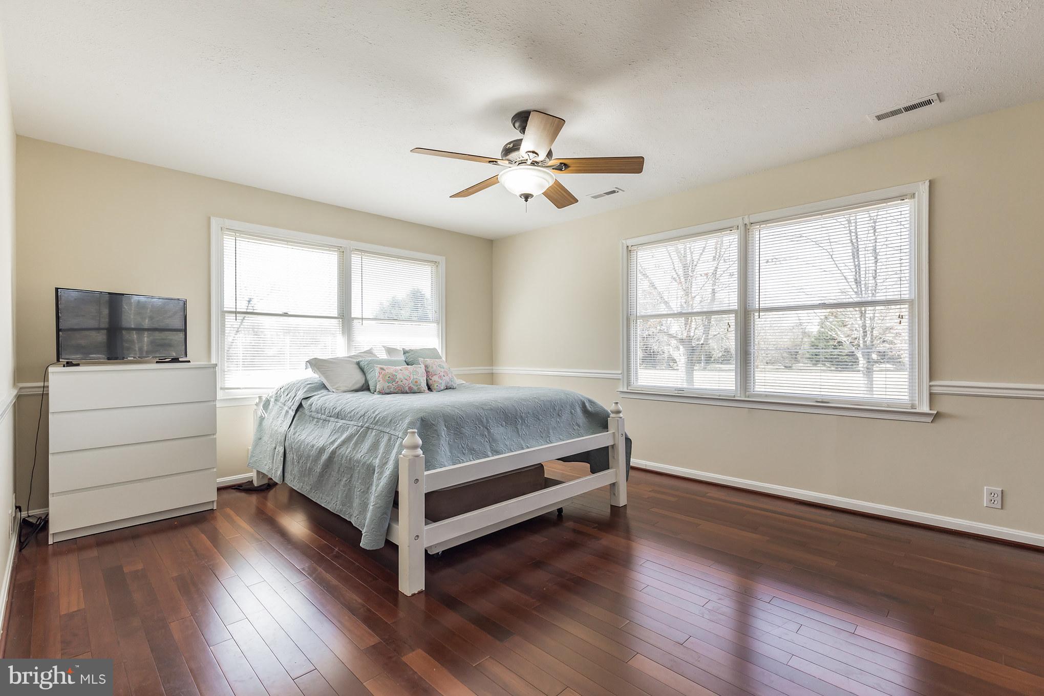 3142 Soper Road Huntingtown, MD 20639 - Photo 13 of 30 a bedroom with a bed and a window
