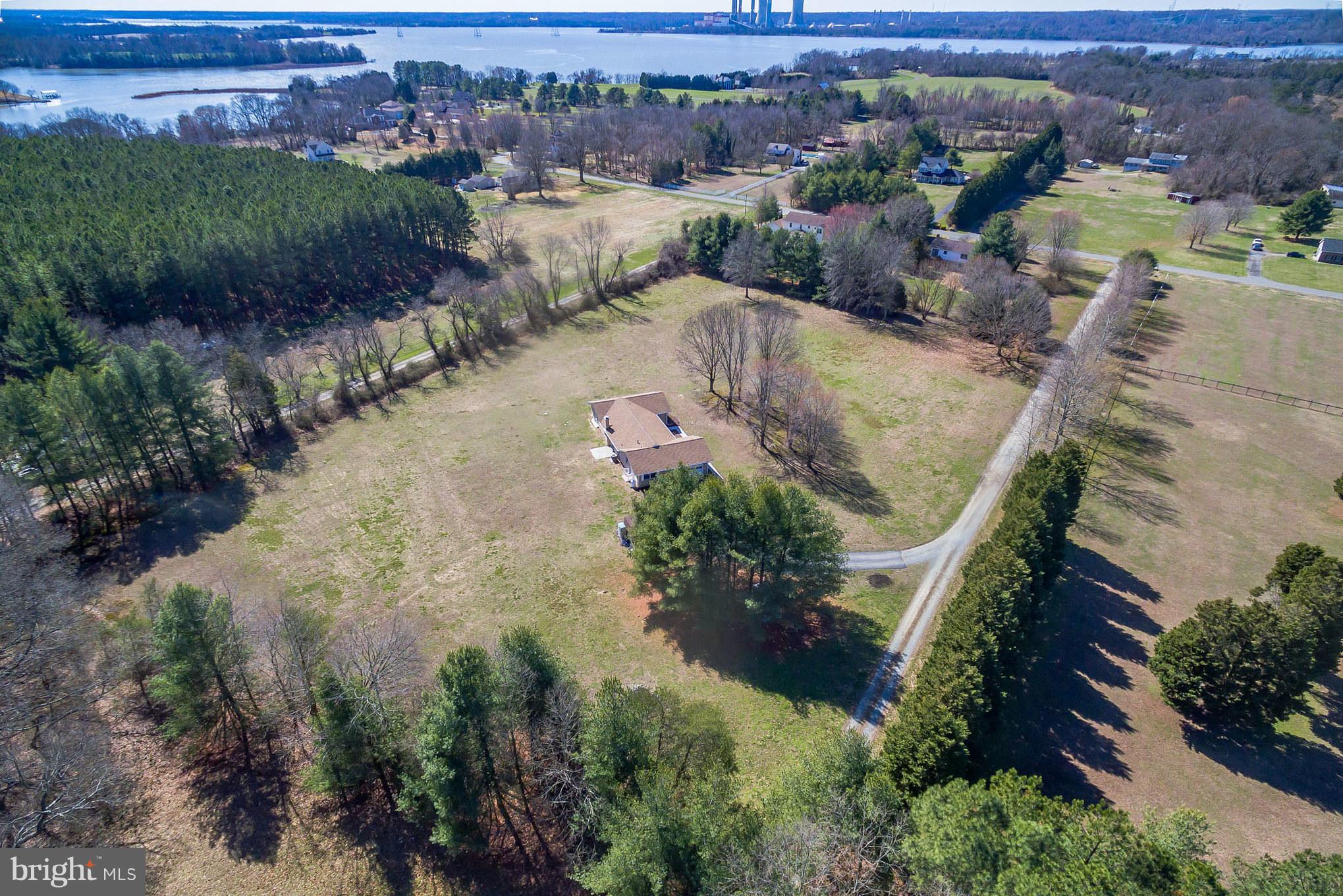 3142 Soper Road Huntingtown, MD 20639 - Photo 18 of 30 an aerial view of a house with a lake view