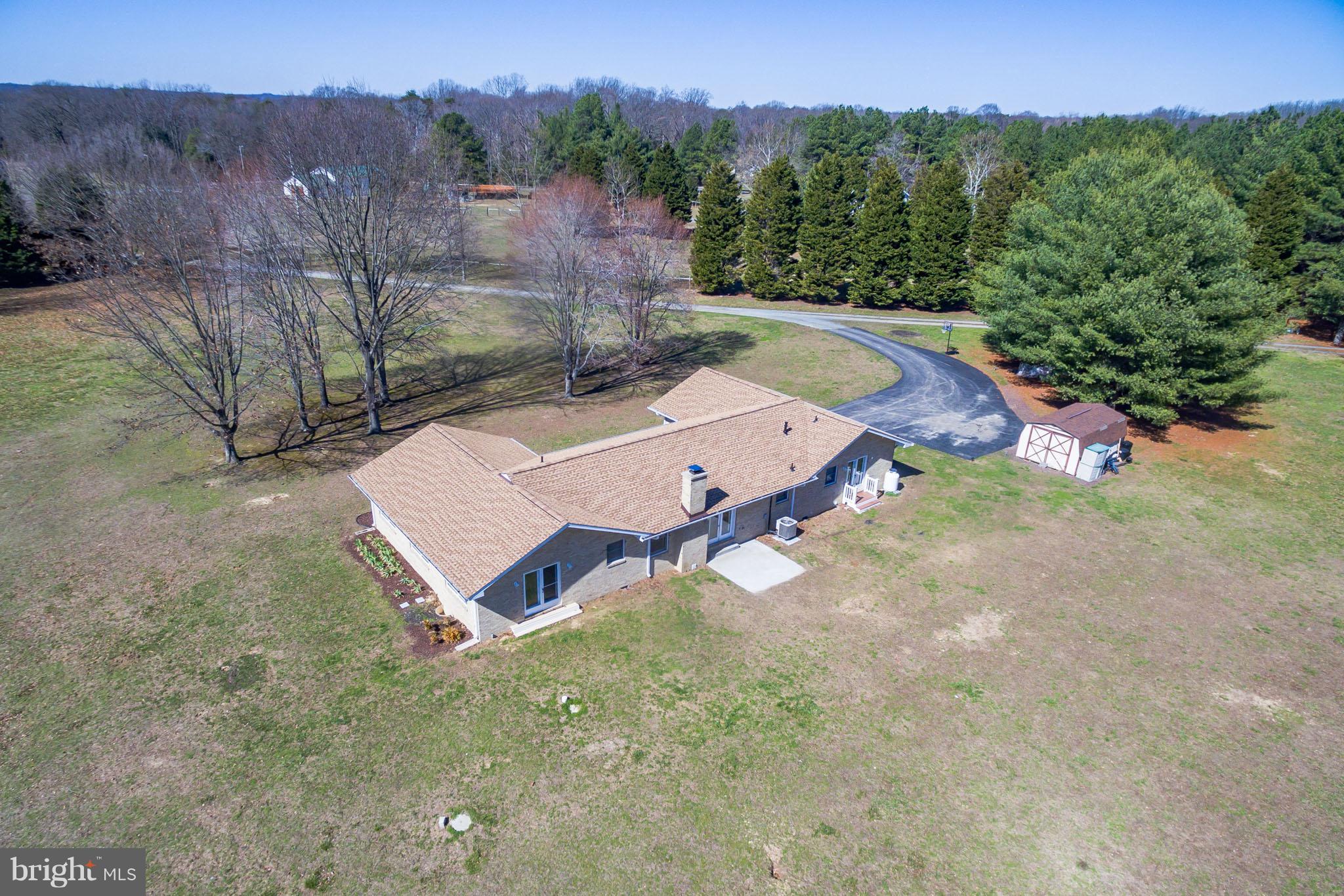 3142 Soper Road Huntingtown, MD 20639 - Photo 3 of 30 an aerial view of a house with mountain view
