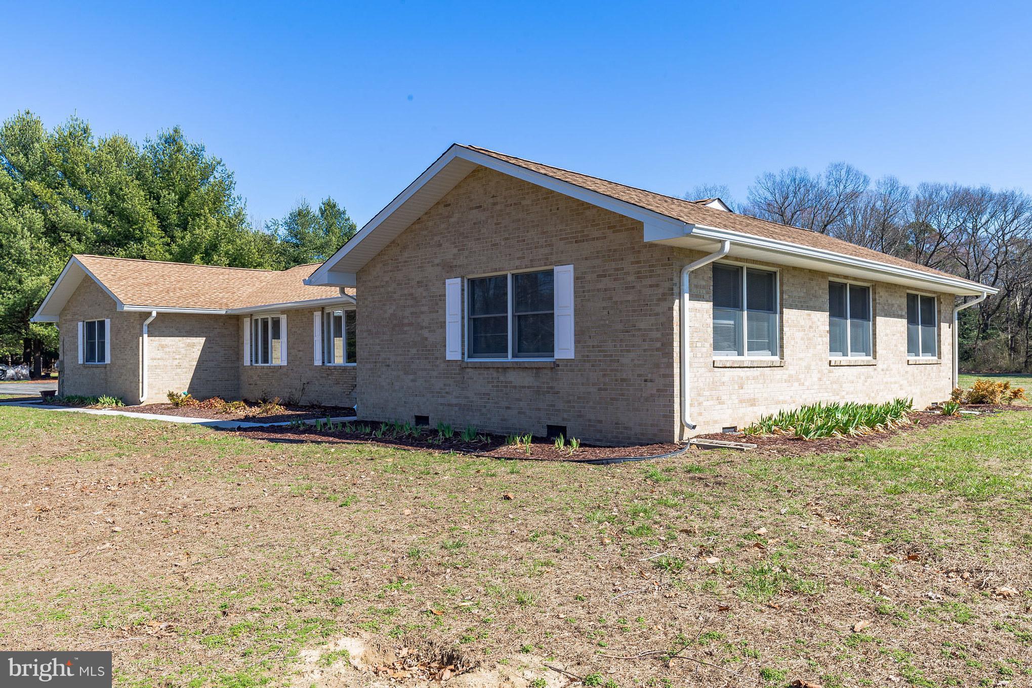 3142 Soper Road Huntingtown, MD 20639 - Photo 8 of 30 a view of a house with a yard