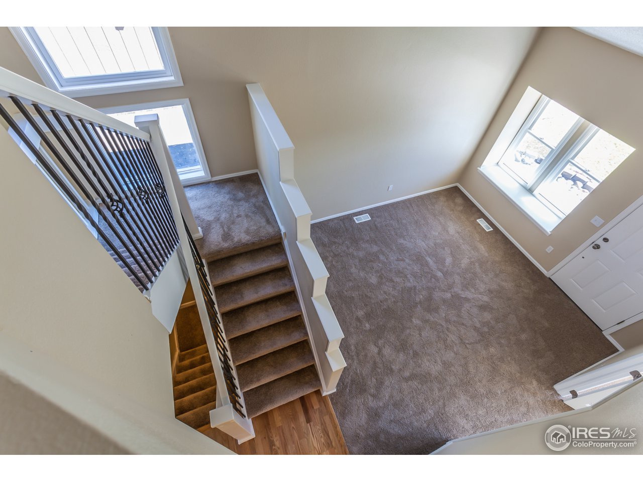 4119 Snow Ridge Circle Fort Collins, CO 80526 - Photo 17 of 28 View down to Main Floor