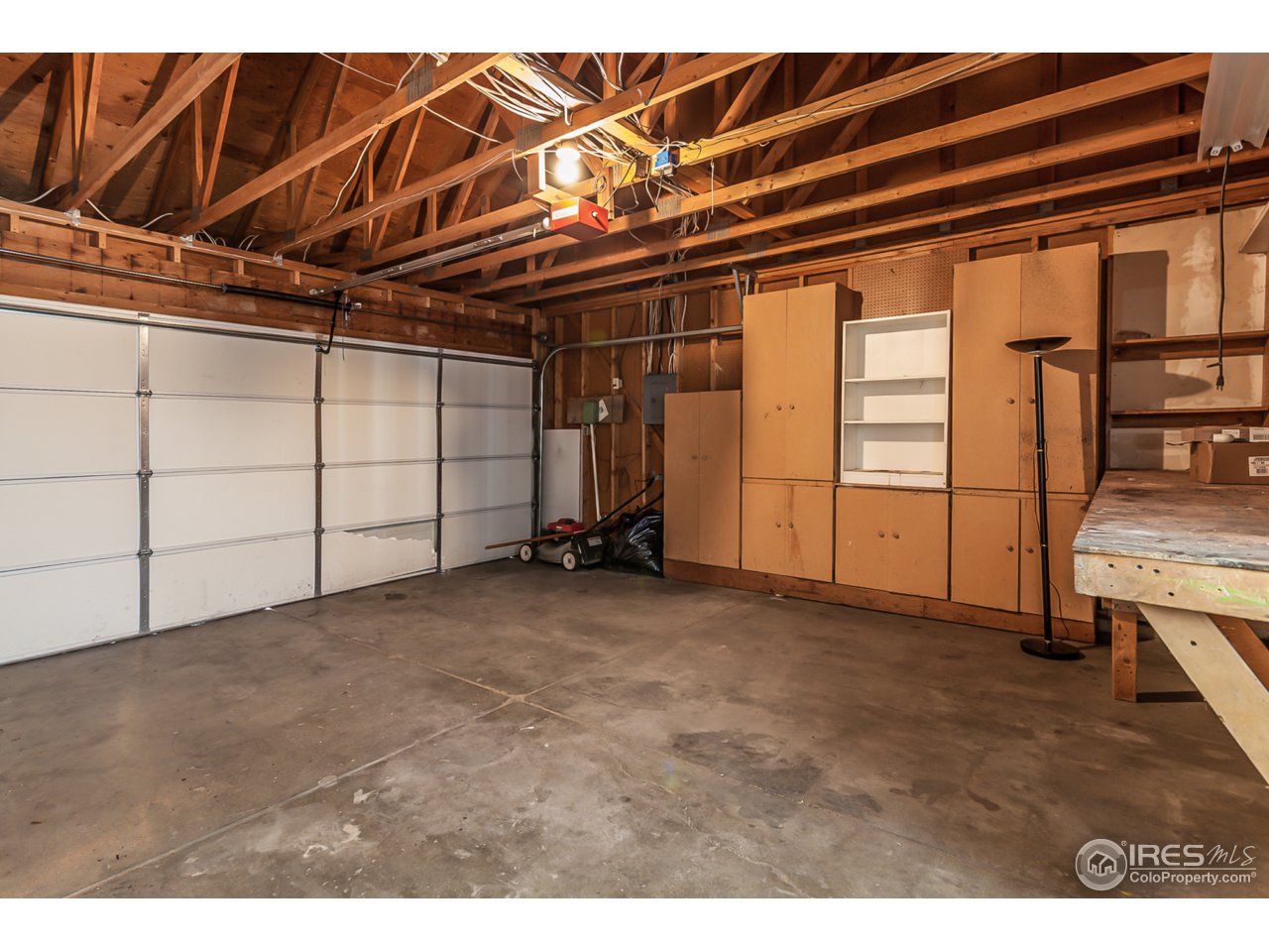 4119 Snow Ridge Circle Fort Collins, CO 80526 - Photo 23 of 28 2 Car Garage with Shelving