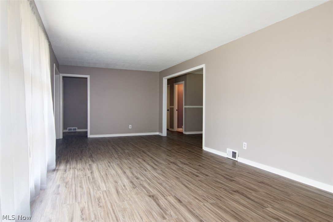 4279 Tapper Road Barberton, OH 44203 - Photo 5 of 27 A wall of original windows lets in loads of natural light.