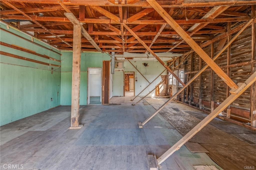 781 Harbor Street Morro Bay, CA 93442 - Photo 12 of 13 a view of a room with wooden floor and stairs