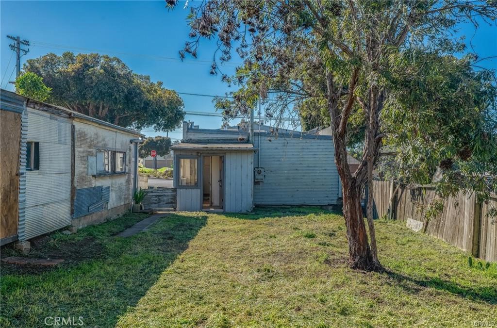 781 Harbor Street Morro Bay, CA 93442 - Photo 7 of 13 a view of a backyard with large trees and a barn