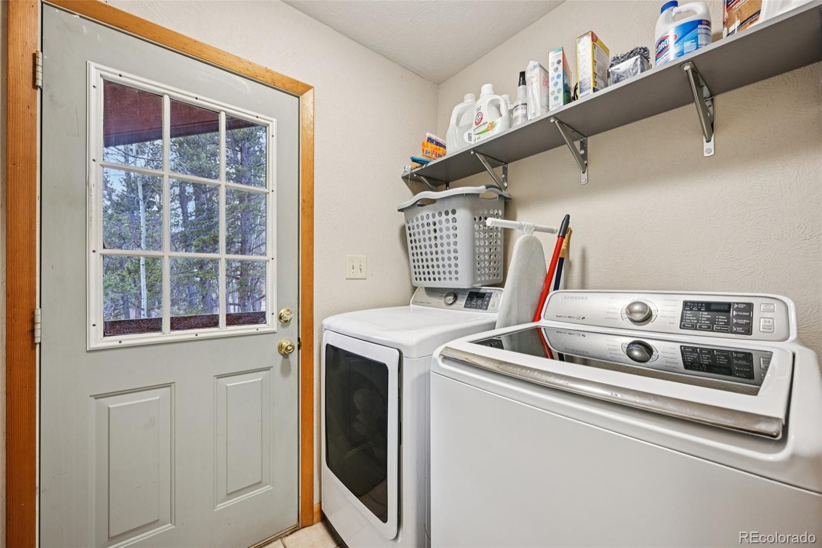 206 Pinon Circle Black Hawk, CO 80422 - Photo 18 of 50 a utility room with dryer and washer
