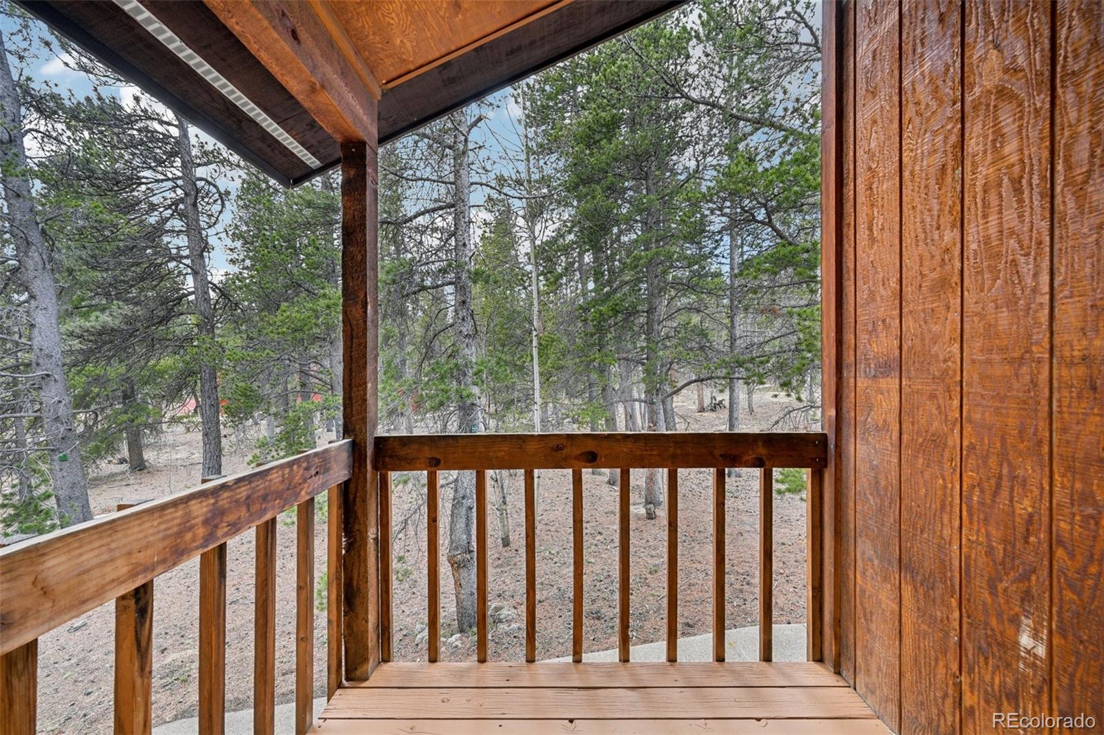 206 Pinon Circle Black Hawk, CO 80422 - Photo 19 of 50 a view of a wooden fence