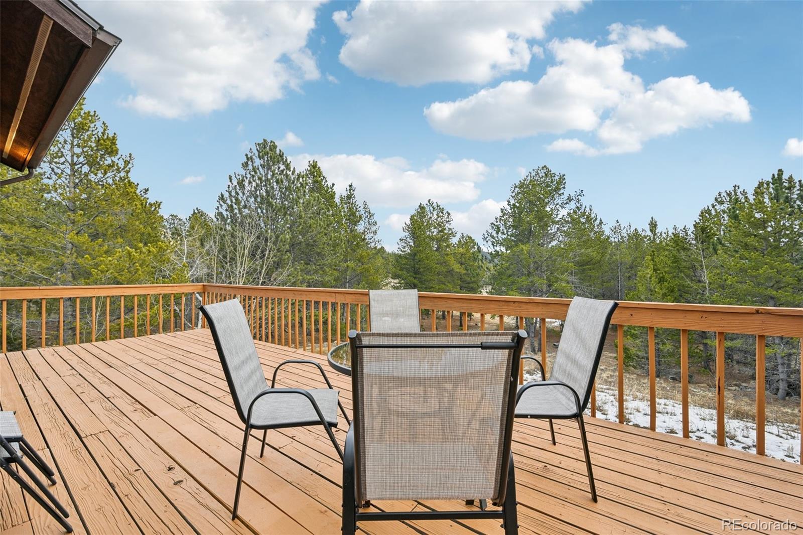206 Pinon Circle Black Hawk, CO 80422 - Photo 22 of 50 a view of a balcony with furniture