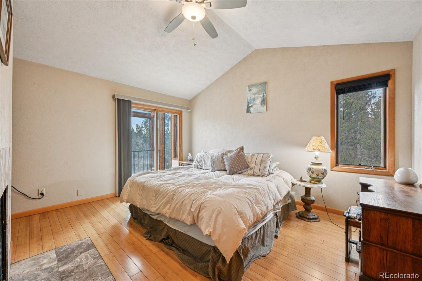 206 Pinon Circle Black Hawk, CO 80422 - Photo 25 of 50 a bedroom with a bed and window