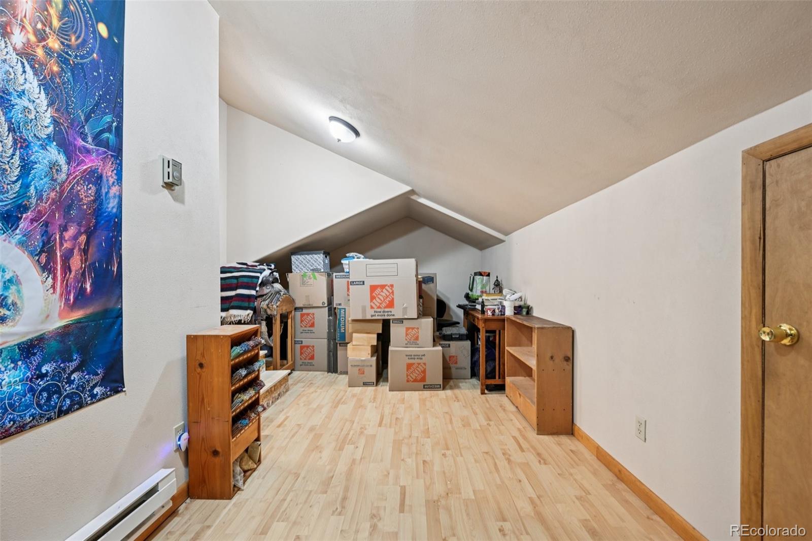 206 Pinon Circle Black Hawk, CO 80422 - Photo 34 of 50 a view of a hallway with furniture and closet