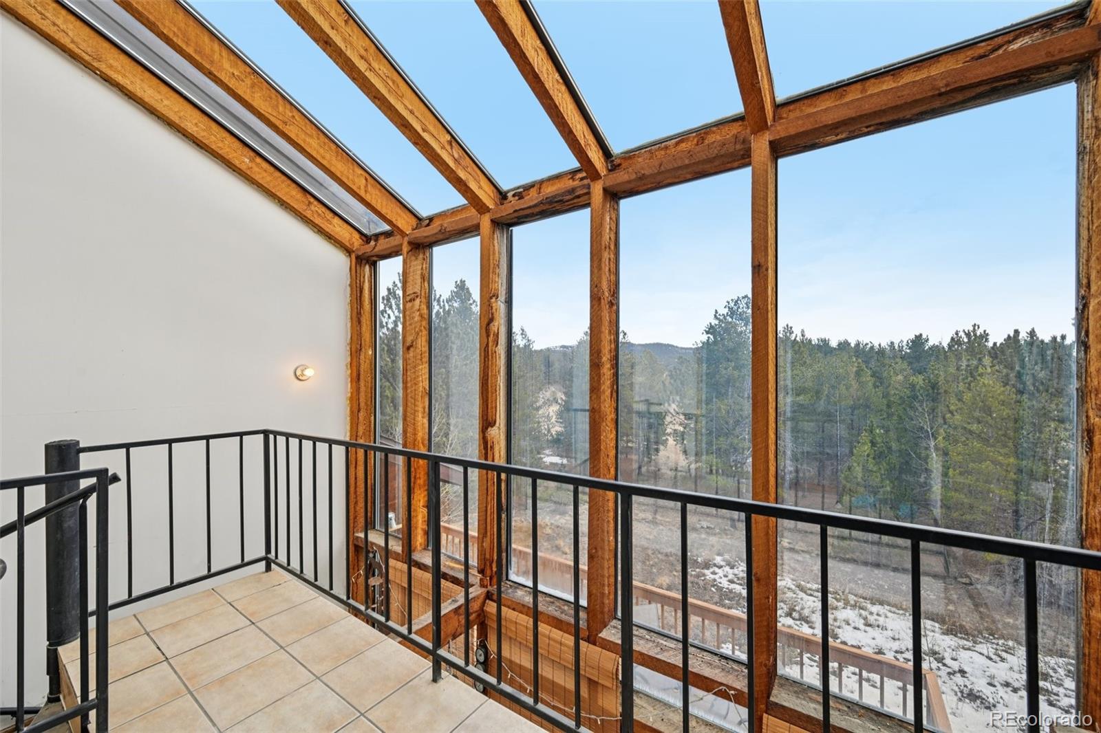 206 Pinon Circle Black Hawk, CO 80422 - Photo 37 of 50 a view of balcony with furniture