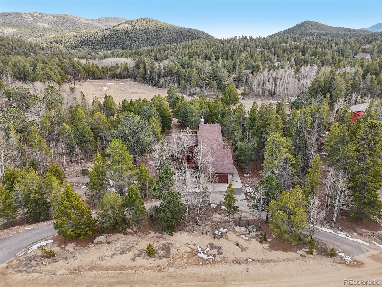 206 Pinon Circle Black Hawk, CO 80422 - Photo 43 of 50 an aerial view of a house with a yard