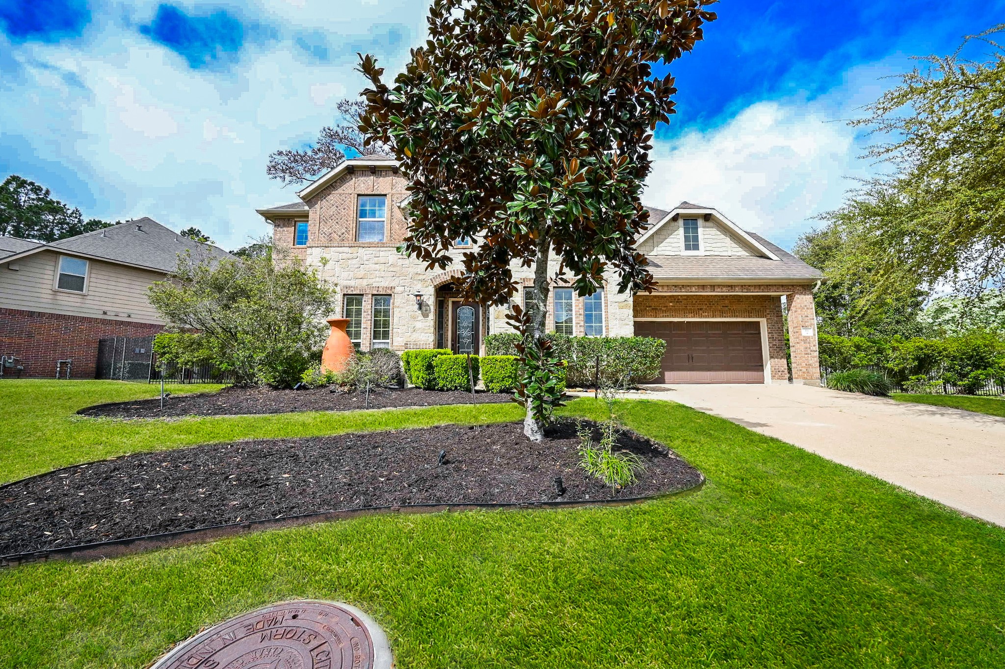 Welcoming exterior with lush landscaping