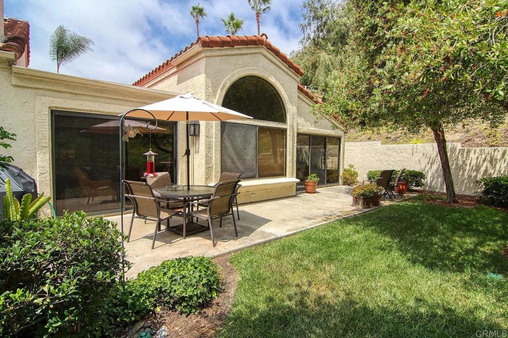 7302 Paseo Verde Carlsbad, CA 92009 - Photo 2 of 24 a view of a house with backyard porch and sitting area