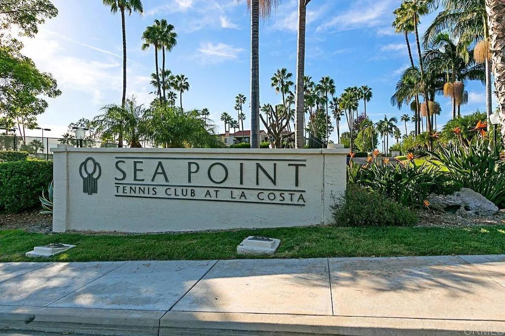 7302 Paseo Verde Carlsbad, CA 92009 - Photo 22 of 24 a sign broad on the side of a street