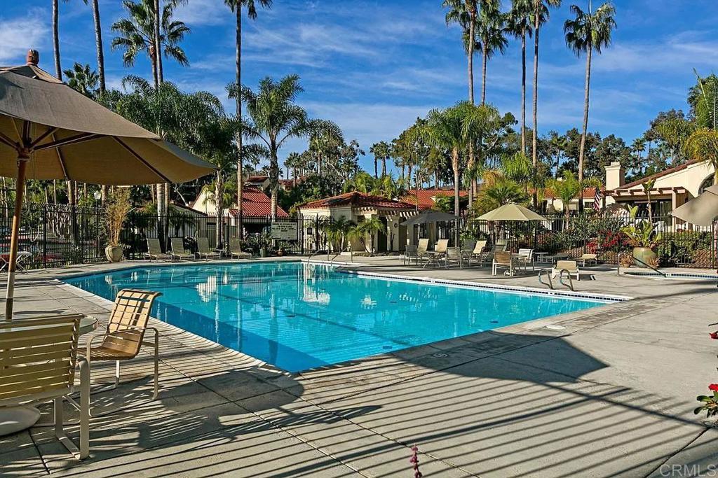 7302 Paseo Verde Carlsbad, CA 92009 - Photo 23 of 24 a view of a swimming pool with a patio
