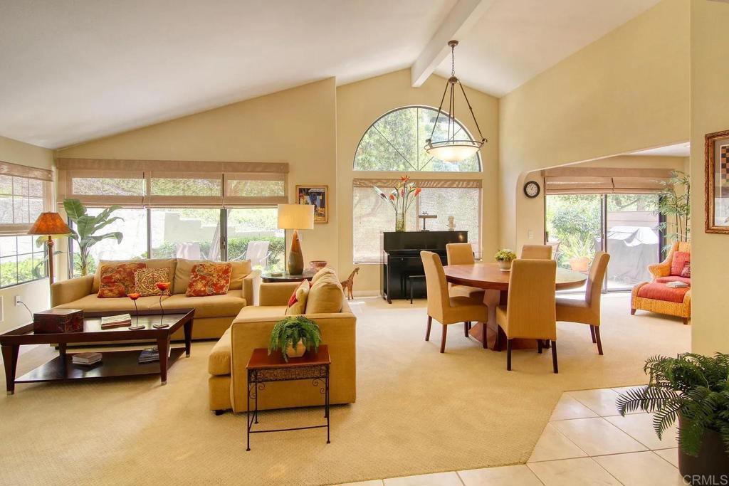 7302 Paseo Verde Carlsbad, CA 92009 - Photo 3 of 24 a living room with furniture and a large window