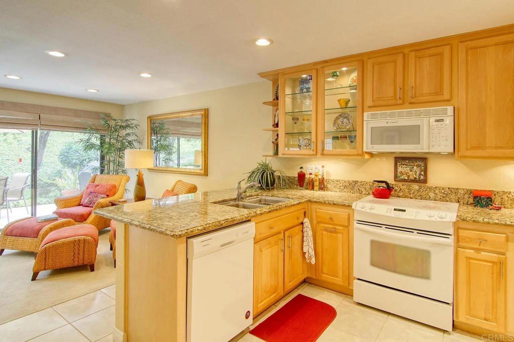 7302 Paseo Verde Carlsbad, CA 92009 - Photo 4 of 24 a view of utility room and washer and dryer