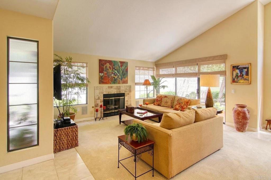 7302 Paseo Verde Carlsbad, CA 92009 - Photo 10 of 24 a living room with furniture and a fireplace