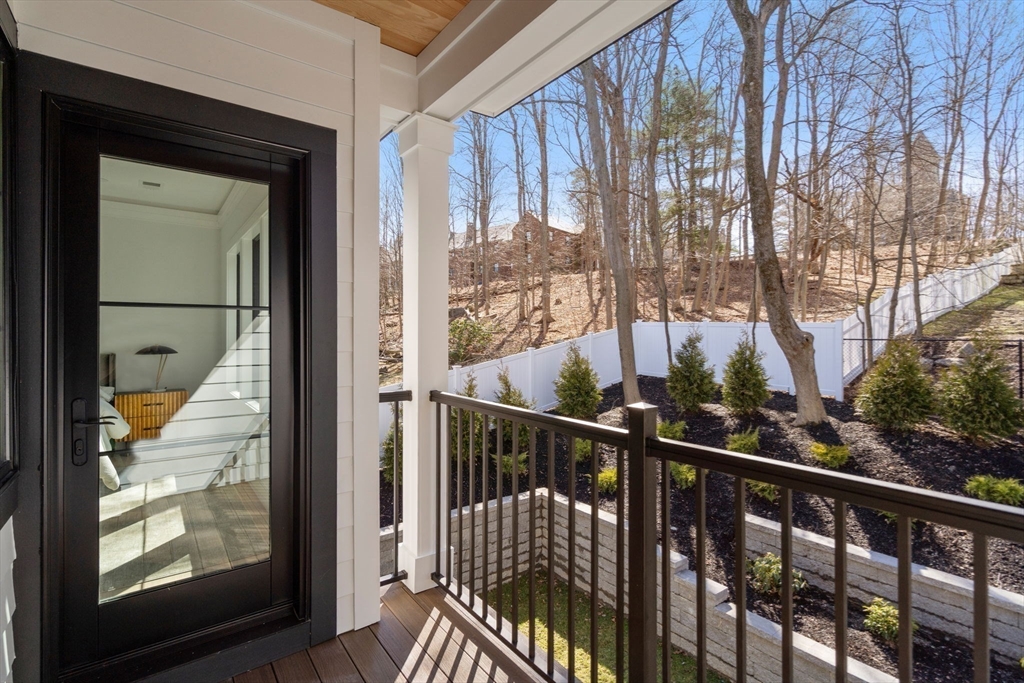 49 Ripley Street Newton, MA 02459 - Photo 15 of 32 a view of a balcony with wooden floor