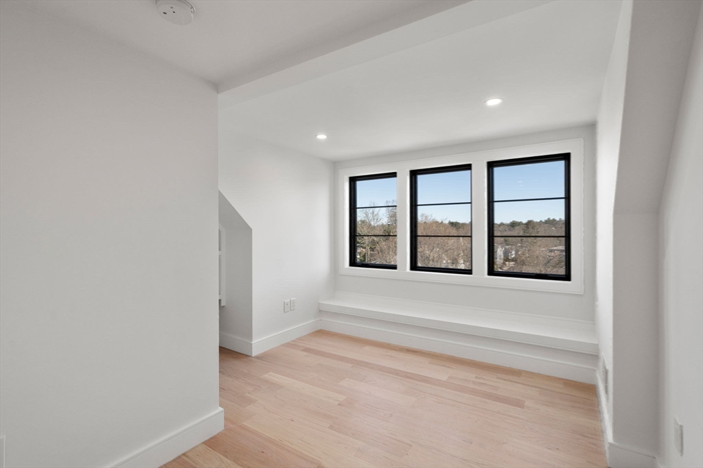 49 Ripley Street Newton, MA 02459 - Photo 23 of 32 a view of an empty room with window