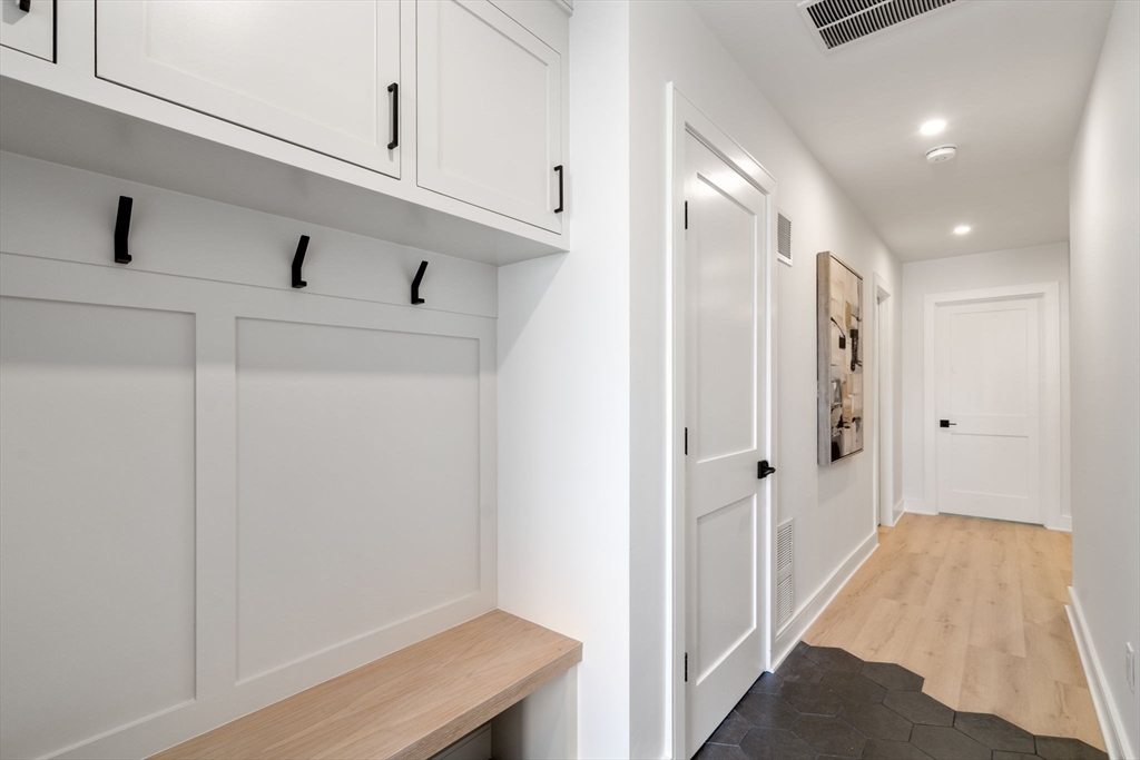 49 Ripley Street Newton, MA 02459 - Photo 26 of 32 a bathroom with a sink and shower