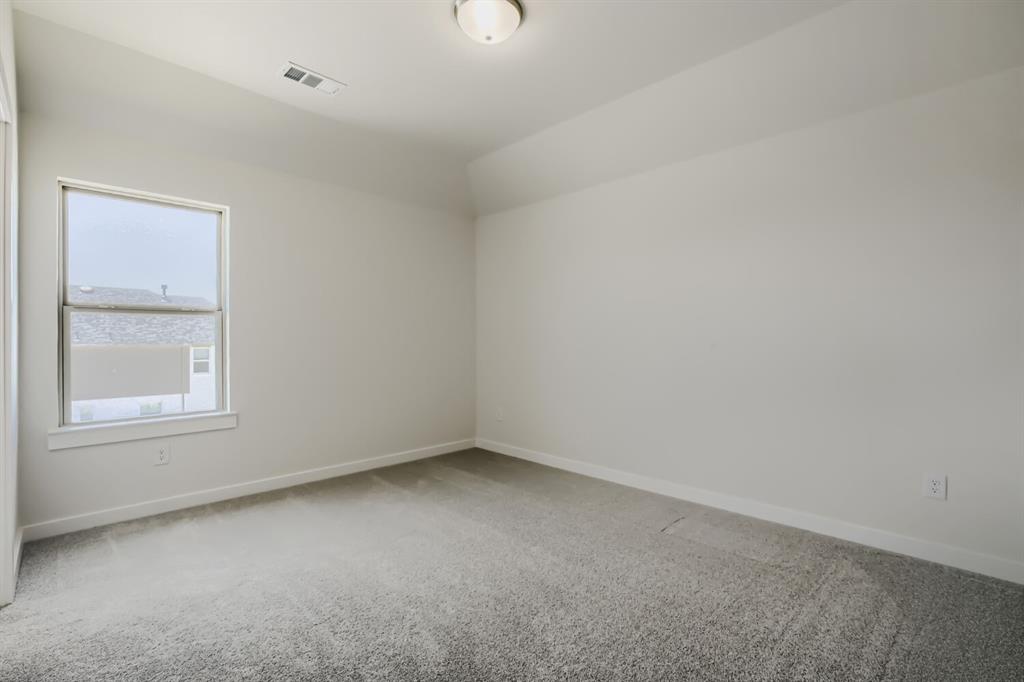 828 Stone Grv Road Lavon, TX 75166 - Photo 17 of 27 Room featuring light grey carpeting, white baseboards, and neutral wall paint