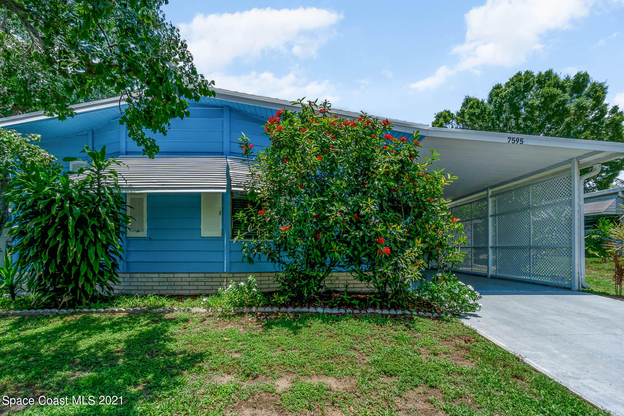 7595 Blackhawk Road Sebastian, FL 32976 - Photo 1 of 32 Jones7595BlackhawkPhotoPack_38-Edit