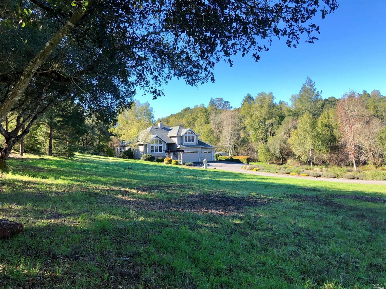 2455 Laguna Road Santa Rosa, CA 95401 - Photo 1 of 1 a view of a field with a tree in the background