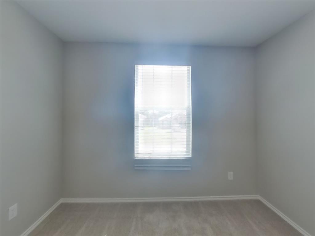 216 Rambling Way Forney, TX 75126 - Photo 12 of 22 a small space with a window