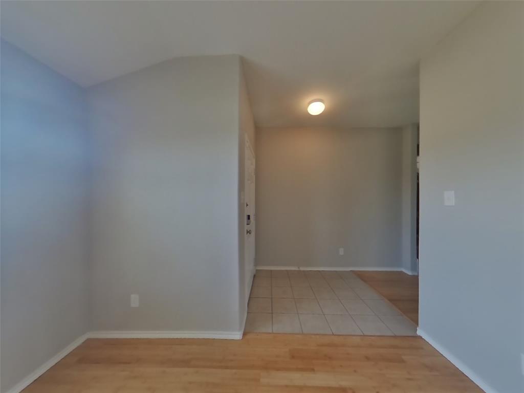 216 Rambling Way Forney, TX 75126 - Photo 17 of 22 a view of hallway with wooden floor